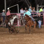 Ashlee McCoy competing in breakaway roping