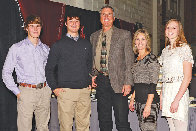 The Svoboda Family (from left to right) Cade, older brother Cole, father Von, mother Angie and younger sister Cora 